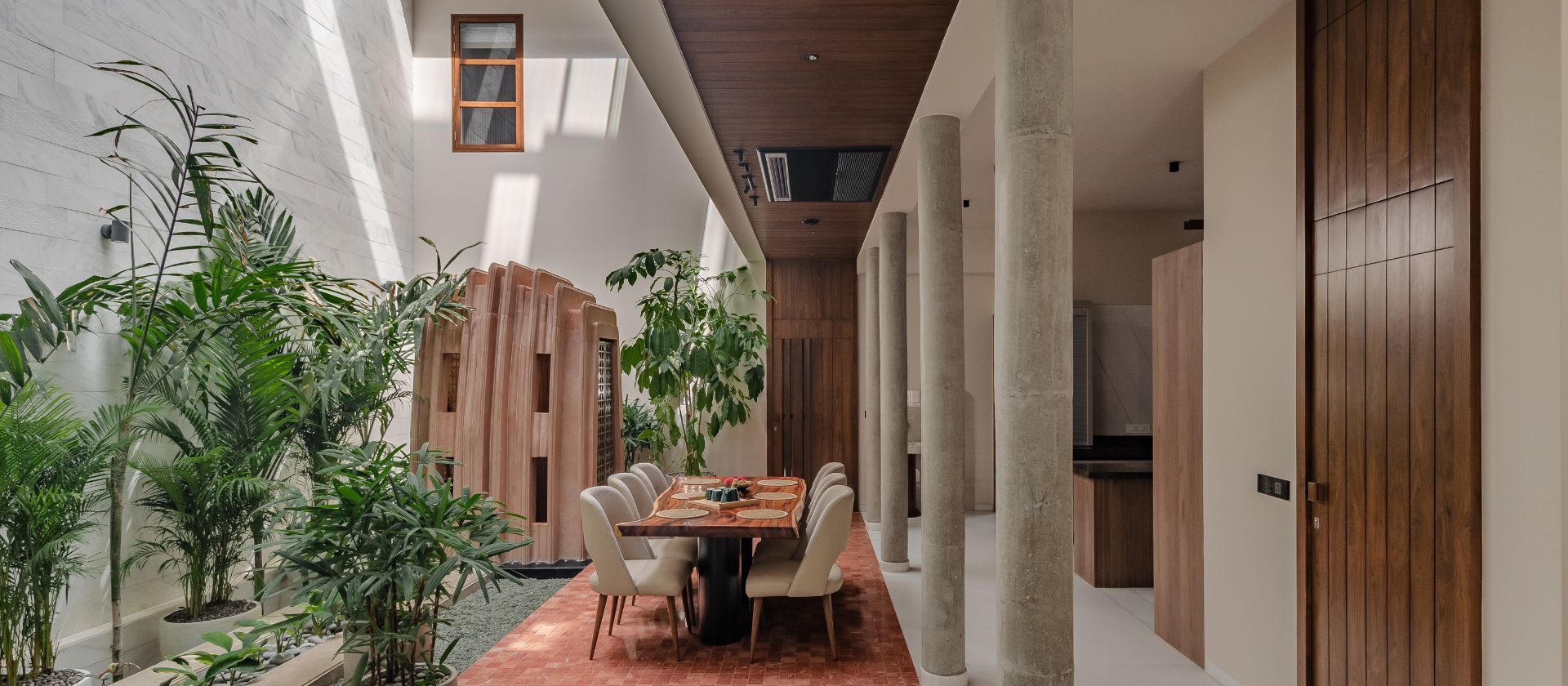 This residence by Aangan Architect is built for the pause